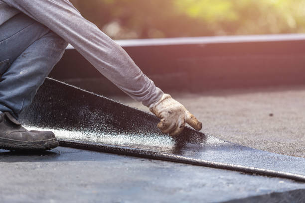 Professional Basement Waterproofing technician working in Crawford, GA